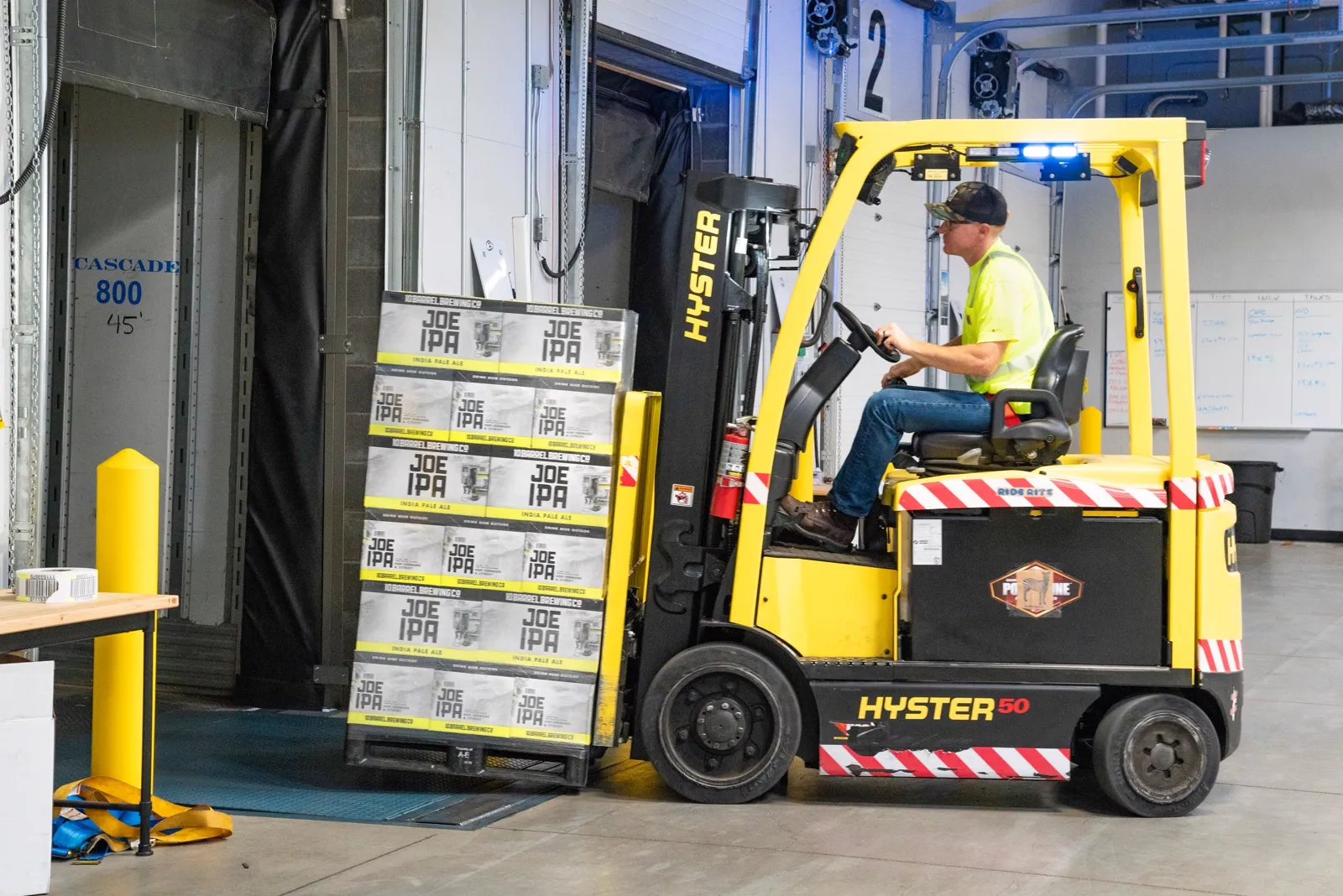 Used Hyster pneumatic tire forklift working an outdoor yard in Central PA